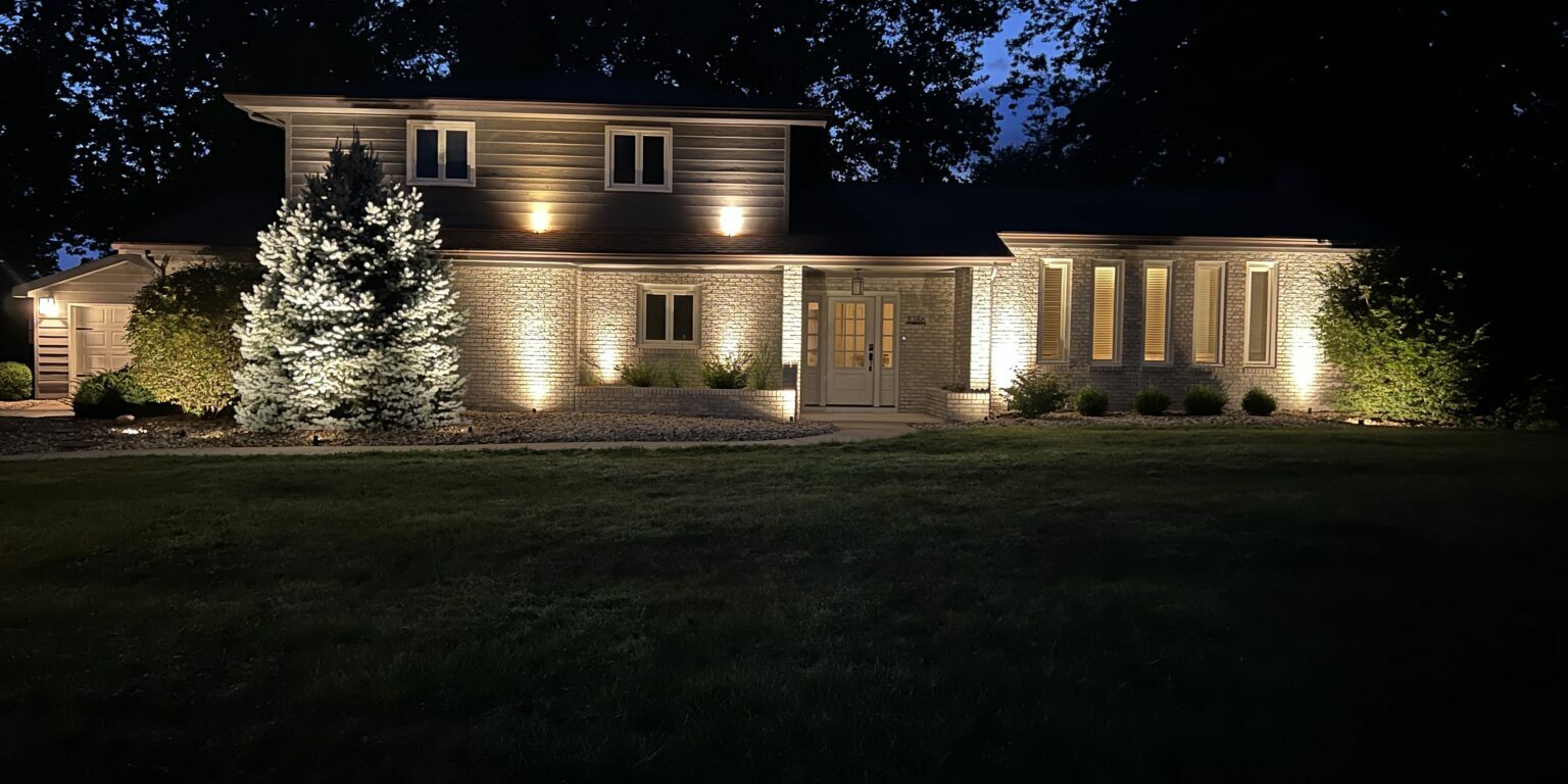 uplighting on large home.